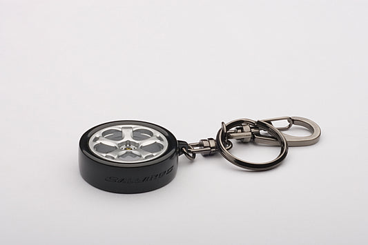 40444 1:18 LAMBORGHINI GALLARDO WHEEL KEYCHAIN (PLASTIC WHEEL/BLACK METAL TYRE)